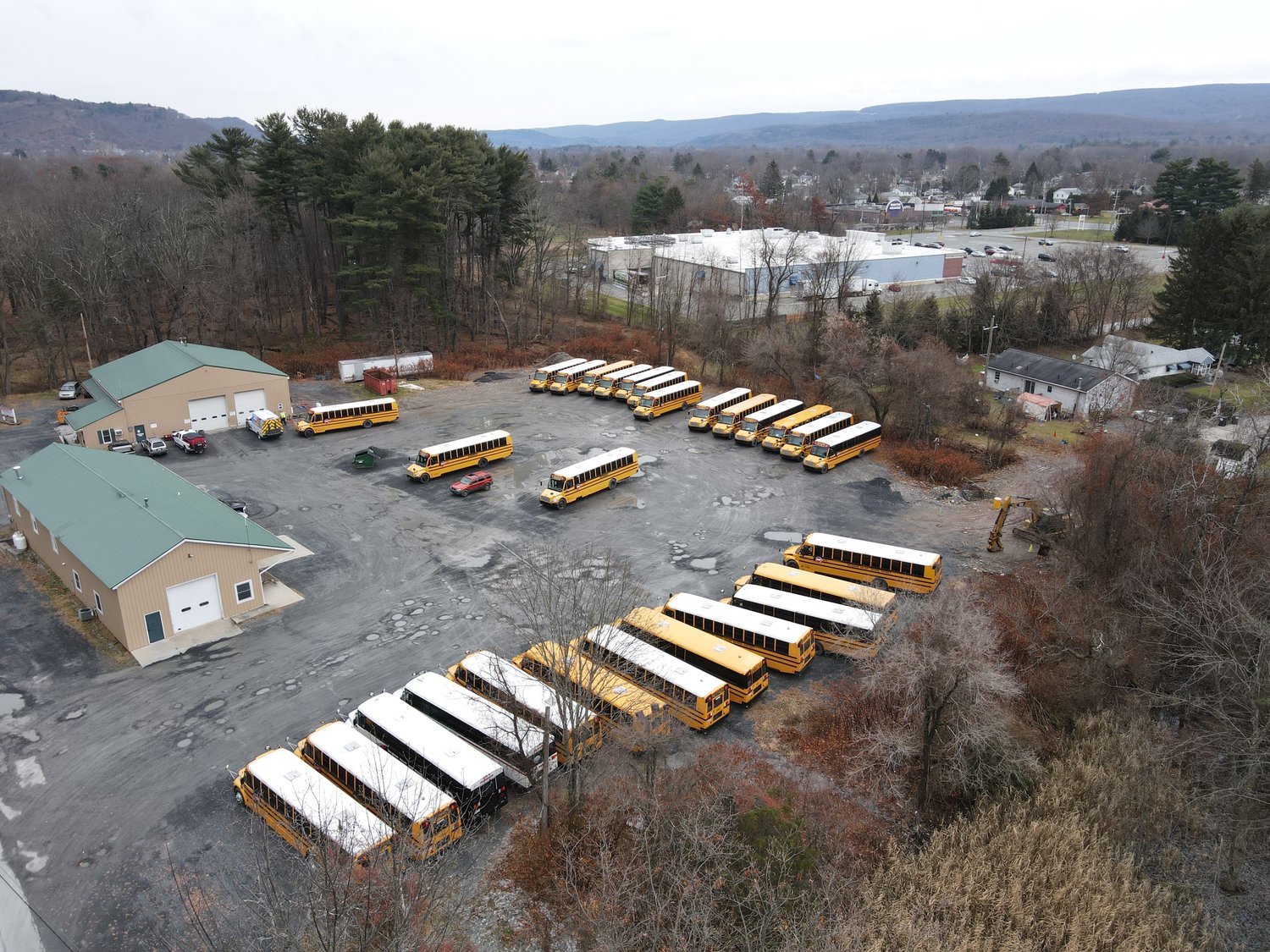 The parking lot at the Delaware Valley School District bus garage is empty on December 7, due to a bus driver shortage following COVID-19 exposure.